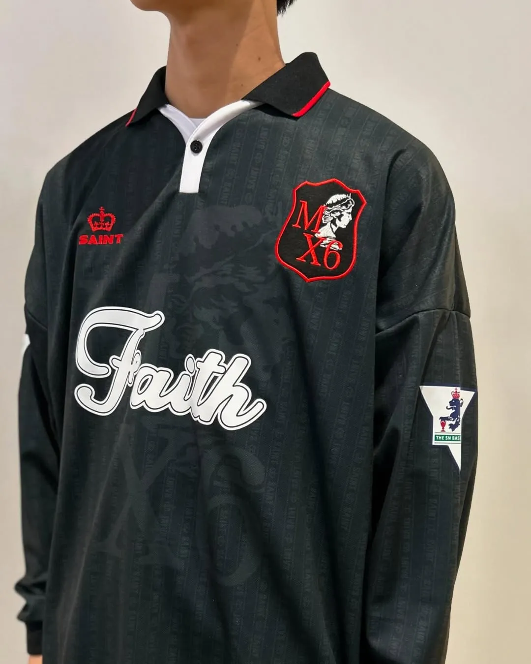 SAINT M×××××× SOCCER SHIRT 'FAITH'/BLK FAITH Football Long Sleeve Black S-XL This design has a lot of craftsmanship Digital fabric printing/front positioning printing laser cutting Offset printing + flocking printing + embossing Imported Behringer machine embroidery Flat machine collar + cuffs Genuine consistent main mark/wash mark/cherub mark